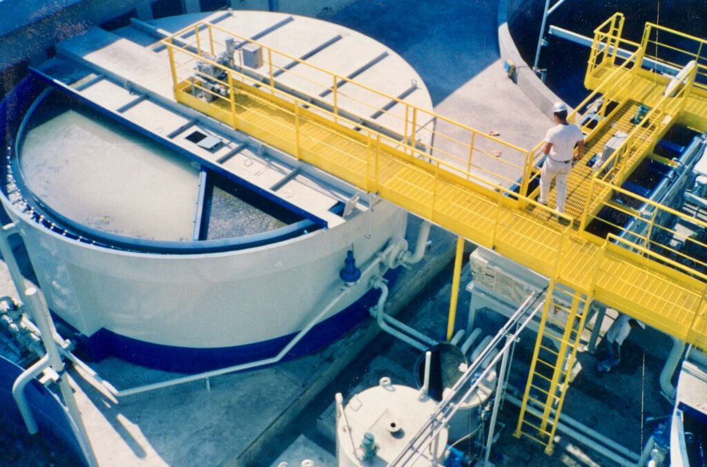 Close-up of lamella clarifier plates inside an industrial wastewater treatment system by Hoffland Environmental, Inc. — designed to maximize settling efficiency and reduce footprint in compact plant designs
